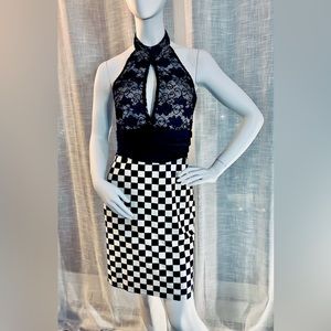 Unique Christmas option. Plunge halter neckline with chic checker and sash belt.